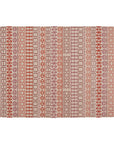 NAIDU Tæppe i 100 % uld med dekorative grafiske mønstre i røde, rosa og beige nuancer - håndvævet design med etnisk og moderne udtryk.