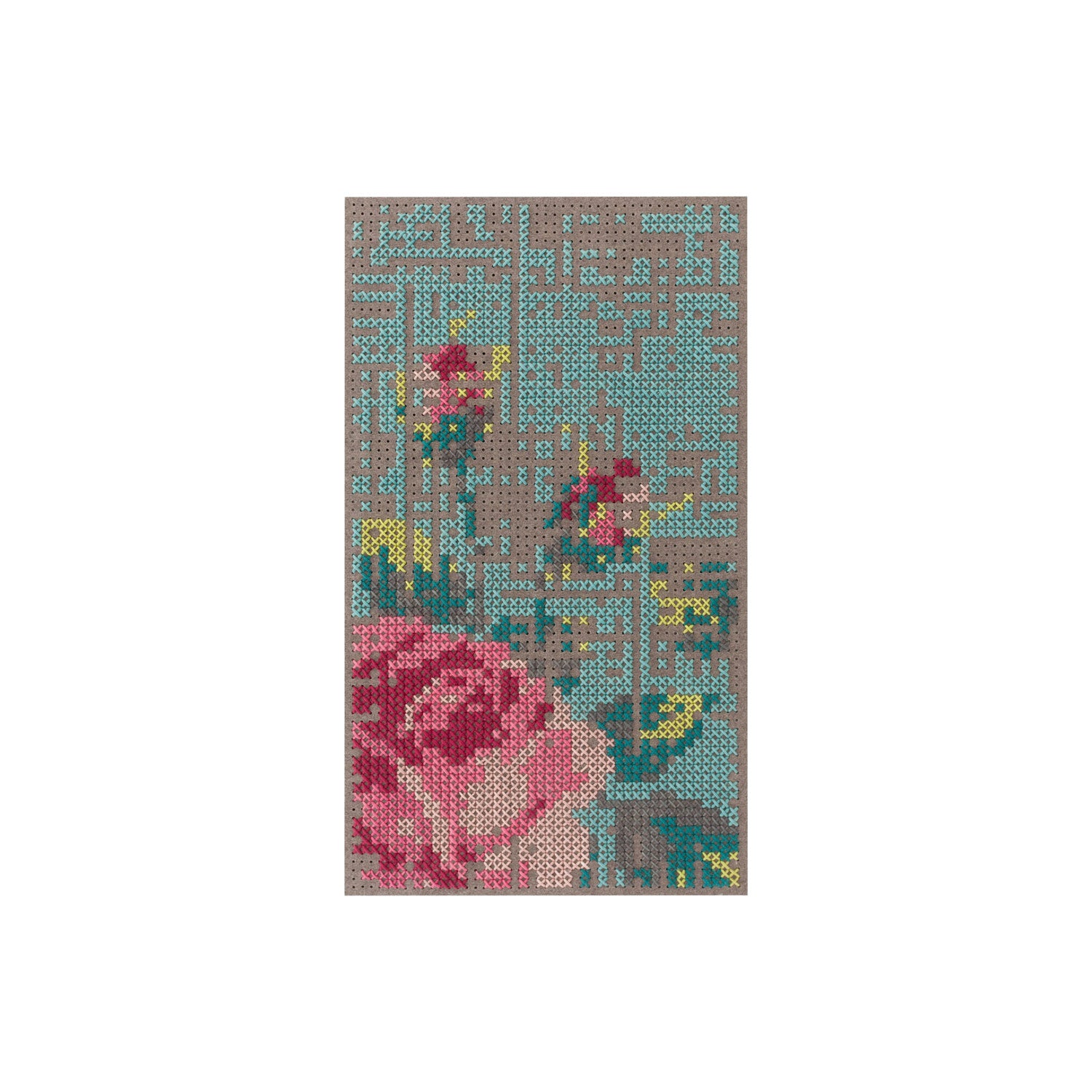 Lille tæppe med pink og grønne blomstermotiver på turkis og brun baggrund – et farverigt blikfang i interiøret.
